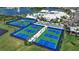 Aerial view of community pickleball and tennis courts at 10336 Wynward Way, Parrish, FL 34219