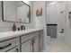 Stylish bathroom with modern vanity and shower/tub combo at 10336 Wynward Way, Parrish, FL 34219