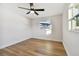 Bright bedroom featuring light wood flooring at 10721 64Th Ave, Seminole, FL 33772