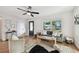 Spacious living room with hardwood floors and plenty of light at 10721 64Th Ave, Seminole, FL 33772