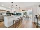Open concept kitchen with island seating and breakfast nook at 10721 64Th Ave, Seminole, FL 33772