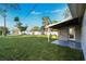 Large backyard with grassy area and patio at 10721 64Th Ave, Seminole, FL 33772