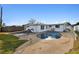 Backyard oasis featuring a kidney-shaped pool at 10763 109Th Way, Largo, FL 33778