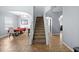 Elegant entryway with a grand staircase at 10836 Standing Stone Dr, Wimauma, FL 33598