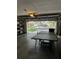 Garage with ping pong table and extra storage at 16501 Cranwood Pl, Tampa, FL 33618