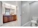 Bathroom with a toilet and double vanity at 17036 Peaceful Valley Dr, Wimauma, FL 33598