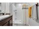 Clean bathroom with a walk-in shower at 17036 Peaceful Valley Dr, Wimauma, FL 33598