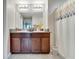 Double vanity bathroom with a shower/tub combo at 17036 Peaceful Valley Dr, Wimauma, FL 33598
