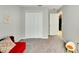 Spacious bedroom with double doors leading to a closet and another room at 17036 Peaceful Valley Dr, Wimauma, FL 33598