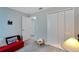 Spacious bedroom with double doors and closet at 17036 Peaceful Valley Dr, Wimauma, FL 33598