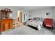 Bedroom with wooden furniture and chair at 17036 Peaceful Valley Dr, Wimauma, FL 33598