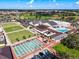 Aerial view of the community recreation facilities with lawn bowling and other activities at 1715 S Pebble Beach Blvd, Sun City Center, FL 33573