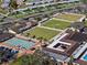 Aerial view of the community lawn bowling facilities and recreation facilities at 1715 S Pebble Beach Blvd, Sun City Center, FL 33573