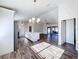 Open floor plan with island kitchen, stainless steel appliances, and recessed lighting at 1715 S Pebble Beach Blvd, Sun City Center, FL 33573