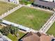 Aerial view of a large, well-maintained lawn bowls court at 1715 S Pebble Beach Blvd, Sun City Center, FL 33573