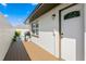 Backyard with deck, grill, and pool access at 3401 W North B St, Tampa, FL 33609