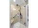 Updated bathroom with a large glass shower enclosure at 3401 W North B St, Tampa, FL 33609