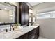 Double vanity bathroom with granite countertop at 3401 W North B St, Tampa, FL 33609