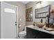 Stylish bathroom with vessel sink and dark vanity at 3401 W North B St, Tampa, FL 33609