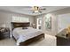Spacious bedroom with king-size bed and ceiling fan at 3401 W North B St, Tampa, FL 33609