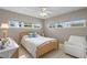 Bright bedroom with a double bed and ceiling fan at 3401 W North B St, Tampa, FL 33609