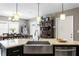 Kitchen with large island, stainless steel sink, and granite countertop at 3401 W North B St, Tampa, FL 33609