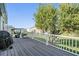 Back deck with golf cart and view of neighborhood at 37635 Gill Ave, Zephyrhills, FL 33541
