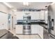 Modern kitchen with stainless steel appliances and granite countertops at 37635 Gill Ave, Zephyrhills, FL 33541