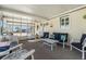 Relaxing screened porch with comfortable seating and ceiling fan at 37635 Gill Ave, Zephyrhills, FL 33541