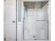 Clean shower with glass enclosure and handheld shower head at 37635 Gill Ave, Zephyrhills, FL 33541