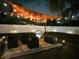 Night view of backyard patio and string lights at 1114 Palm Bluff St, Clearwater, FL 33755