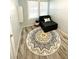 Small bedroom with a daybed and patterned rug at 1114 Palm Bluff St, Clearwater, FL 33755