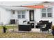 Patio with seating, grill, and shade sail at 1114 Palm Bluff St, Clearwater, FL 33755