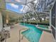 Relaxing pool and spa with golf course view at 1120 Emerald Dunes Dr, Sun City Center, FL 33573