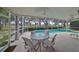 Enjoy the view from this screened pool area at 1120 Emerald Dunes Dr, Sun City Center, FL 33573