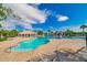 Relaxing pool area with lounge chairs and shaded seating at 11818 Gilmerton Dr, Riverview, FL 33579