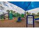 Playground with shade structure, slides, and climbing equipment for children at 11818 Gilmerton Dr, Riverview, FL 33579