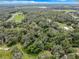 Aerial view of a wooded lot, ideal for those seeking seclusion at 16206 Boyette Rd, Riverview, FL 33579