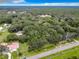 Aerial view of property with houses and a large wooded lot at 16206 Boyette Rd, Riverview, FL 33579