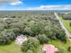 Aerial view of property with houses and a large lot with mature trees at 16206 Boyette Rd, Riverview, FL 33579