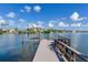 Long dock stretching into the water, perfect for boating at 16434 Redington Dr, Redington Beach, FL 33708