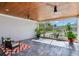 Covered patio with screened enclosure, tile floor and ceiling fans at 16434 Redington Dr, Redington Beach, FL 33708