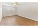 Spacious bedroom with light laminate wood flooring at 1950 59Th N Ave # 114, St Petersburg, FL 33714