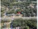 Aerial view showing a house's location in a residential neighborhood at 2012 Deltona Blvd, Spring Hill, FL 34606