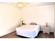 Cozy bedroom with ceiling fan and neutral carpeting at 2100 World Parkway Blvd # 58, Clearwater, FL 33763