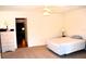 Comfortable bedroom with ceiling fan and adjacent closet at 2100 World Parkway Blvd # 58, Clearwater, FL 33763