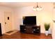 Living room with TV stand and entryway at 2100 World Parkway Blvd # 58, Clearwater, FL 33763