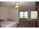 Bright bedroom with ceiling fan and ample natural light at 2100 World Parkway Blvd # 58, Clearwater, FL 33763