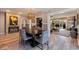 Spacious dining room with a dark wood table and gray velvet chairs at 2134 Serpentine S Cir, St Petersburg, FL 33712