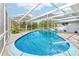 Relaxing kidney-shaped pool, screened patio at 2233 6Th Sw Ave, Largo, FL 33770